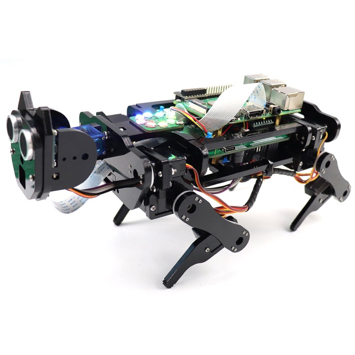 The black acrylic Freenove Robot Dog Kit for Raspberry Pi with exposed circuit boards, ultrasonic sensor face, and four jointed servo legs on a white background.